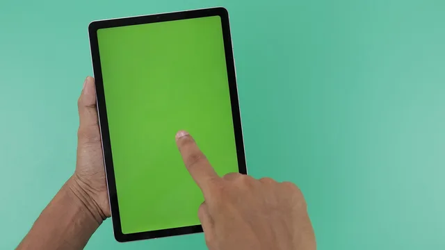 tablet, display, screen, green screen, hands, holding, finger pointing, green screen, green screen, green screen, green screen, green screen. Multilingual social marketing: five tools, one task each